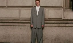 a man in a large suit 