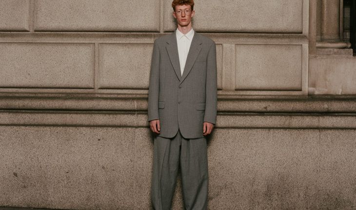 a man in a large suit 