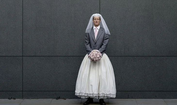 A banker dressed has a jilted bride