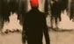a man in paris with an orange hat